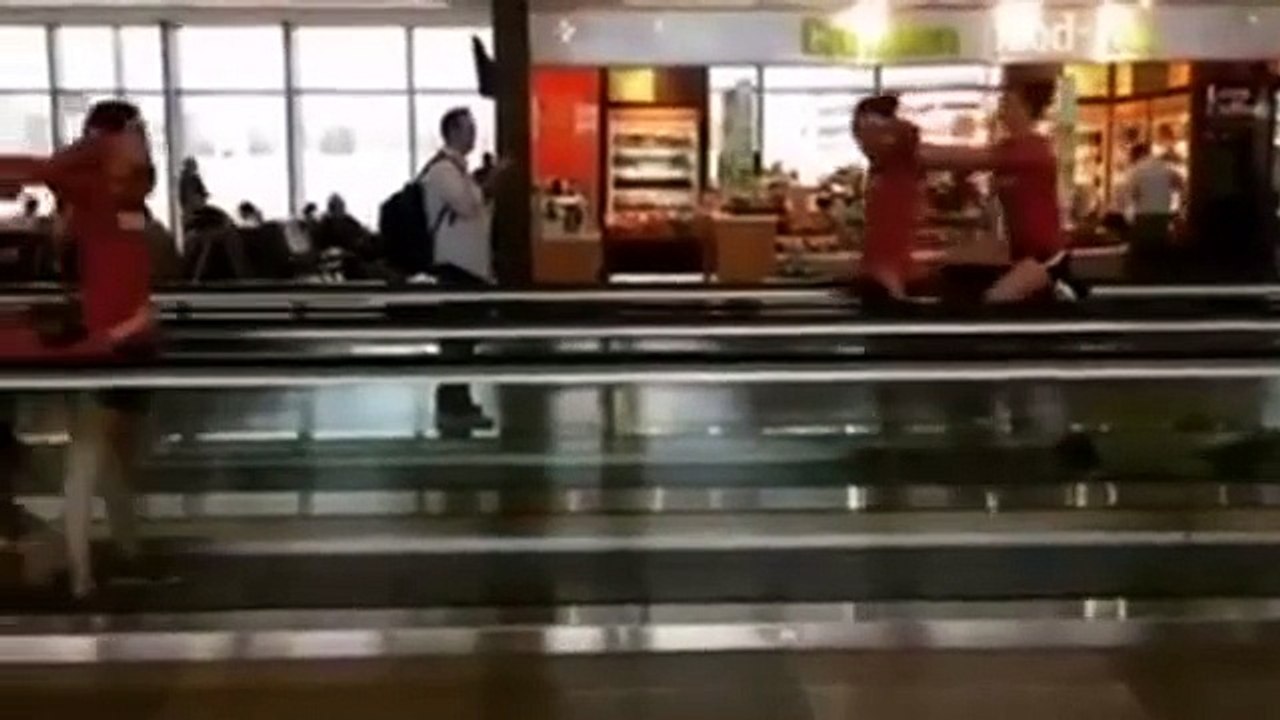 Swimmer Team Swimming In The Airport Just Like Swimming Pool