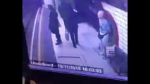 a Muslim woman pushed into a moving train on London Underground.