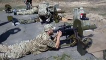 Ukraine War Ukrainian soldiers shoot from Maxim machine gun