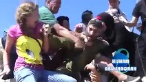 Israeli soldier tries to kidnapp palestinian child.