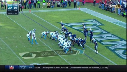 Panthers Cam Newton reaches for a touchdown and celebrates