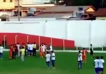 Referee threatens player with a GUN during footie match