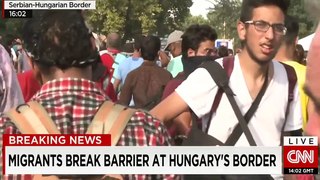 Tear gas and water cannons used on migrants at border