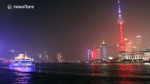 Shanghai lights up landmark in French national colours after Paris attacks