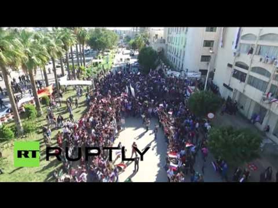 Pro-Russian supporters rally in Syrian port city of Tartus (drone footage)