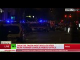 Night in Paris: Hostage situation, dozens dead in gunfire, suicide blasts
