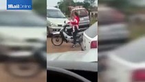 Mother Falls off Her Motorbike While Carrying her BABY!