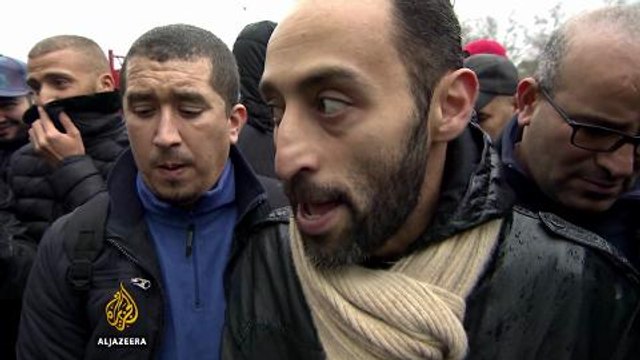 Belgian police raid home after Paris attacks