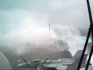 Huge U.S. Navy aircraft carrier is being tossed around by rough seas