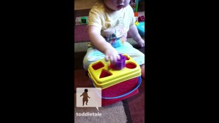 Toddler gives up trying to figure out which hole the shape fits in