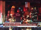 Heroes rescue two people from burning home