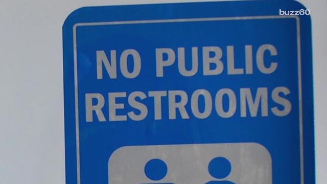 Official who closed public bathrooms ticketed for public urination
