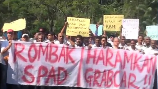 Taxi drivers stage demo against Spad, seek PM's help