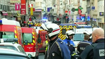 Suspects held over Paris massacre  0:54 / 3:38
