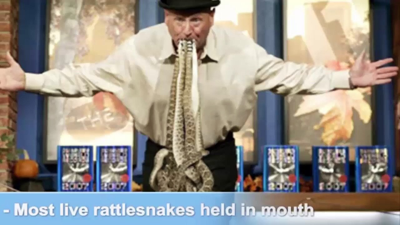 many live snake in mouth,guinness world record