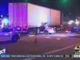 Car under a semi-truck in Tolleson