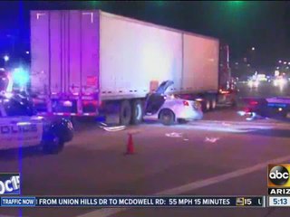 Car under a semi-truck in Tolleson