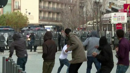 Kosovo police arrest 13, fire tear gas in protest clashes