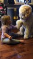 Cute little Girl teaches Dog how to shake and feed him!