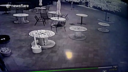 Man tries parkour on pub beer garden tables... fails badly