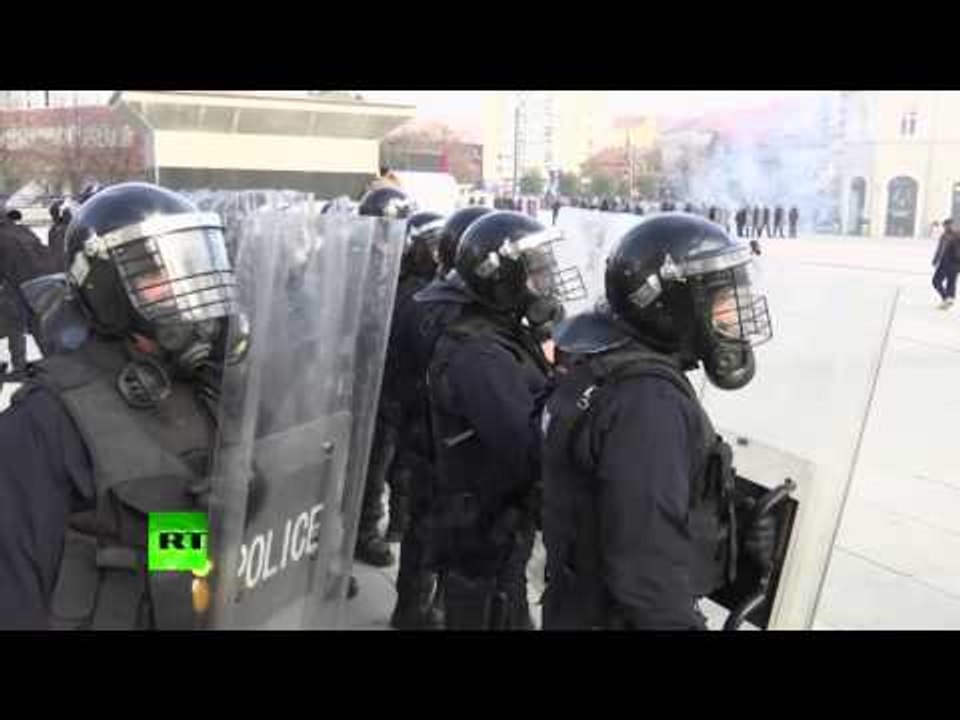 Riots, clashes in Kosovo after police issue arrest warrant for opposition MP