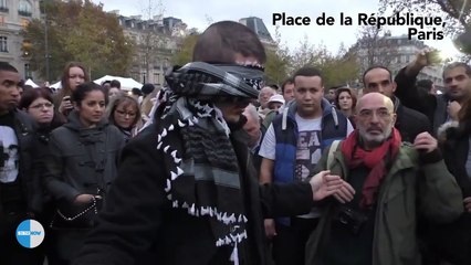 Attentats paris un musulman, les yeux bandés, demande des -câlins- aux passants