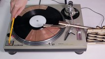 Guy made crazy Techno Music for real with broken Vinyls Discs