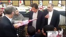 Imran Khan Distributing Cricket Bats Among The Children Of Zamung Kor