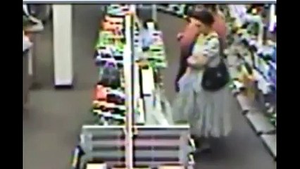 LiveLeak Woman Stuffs $1140 Worth of Computer Parts in Her Dress