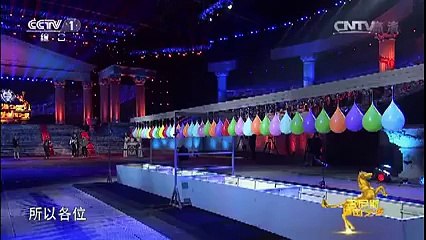 Think he can hit the target with 38 water balloons in the way-