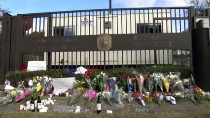 Washington DC mourners pay tribute at French Embassy