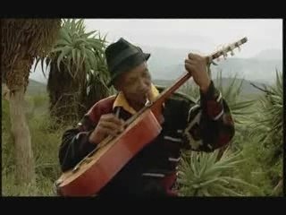Guitare acoustique à la cuillère