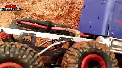 Descargar video: Part2- 20 trucks offroading adventures at Woodgrove Ave - winching, 4x4 rc action, mudding! trails!