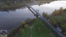 Ile de Gennes, Pont de Gennes vu par drone au crépuscule en automne, Pays de La Loire, France