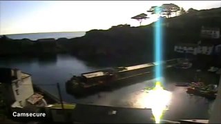 CCTV Captures Light Shaft Descending From Heavens In Polperro Harbour In Cornwall