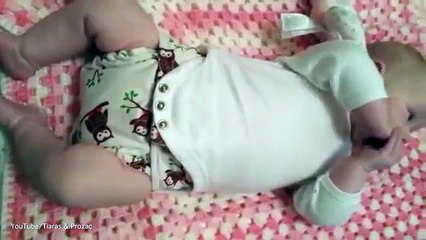 Surprised mum of 10 years learns new nappy changing trick