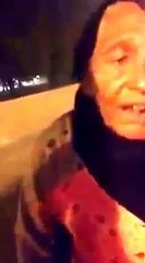 Old poor lady selling candy floss in Lahore Pakistan late night to survive in life