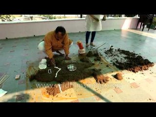 Download Video: Hindus build cow dung hillock to symbolize Mount Govardhan