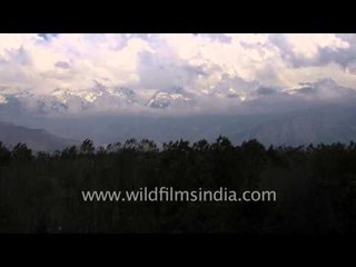 Cloudplay over the Himalayas seen from Kashmir valley - Timelapse