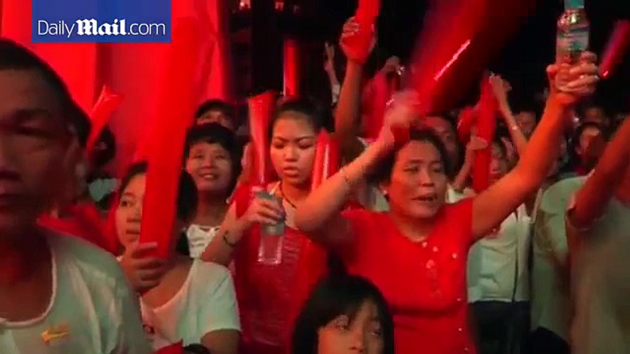 Opposition supporters gather at Suu Kyi's HQ as polls close