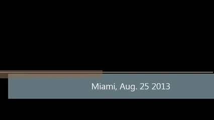 Bill-Goldberg-spears-the-catcher-in-a-baseball-game-in-Miami---August-24-2013