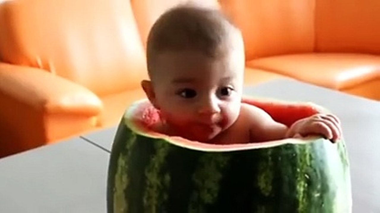 Cute Child in Large Watermelon