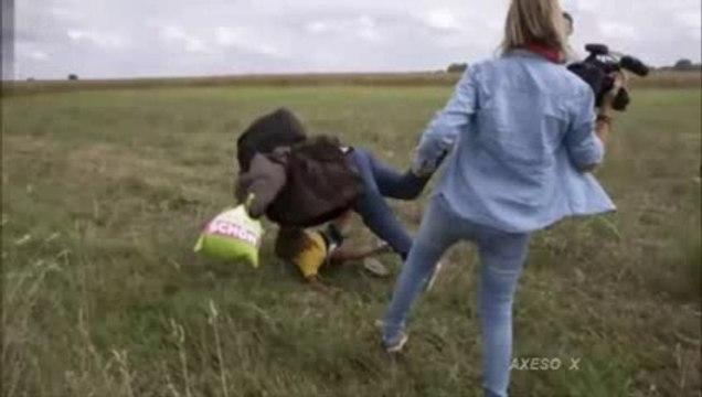 [VIDEO] Hungarian Journalist Caught Tripping And Kicking Refugees