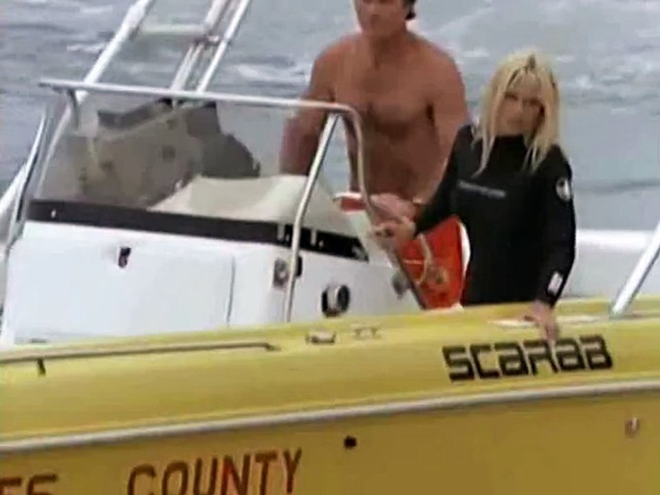 Baywatch lifeguard in a rescue scene