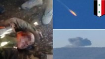 Russian pilots shot at by Syrian rebels as they parachuted to the ground