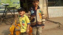 Haris Azeem 3 year old biker بچے کے موٹر سائیکل پر عجیب و غریب کمالات