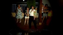 Colin Paul sings 'Return To Sender' at Elvis Week Days Inn Pool party