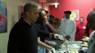 President Barack Obama serves Thanksgiving dinner at a homeless center in Washington, D.C