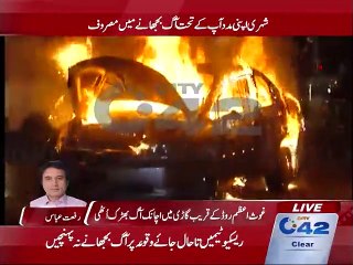 Car suddenly caught fire on Ghous-ul-azam road