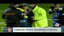 Carlos Tevez abraza a unos aficionados que invadieron el campo en su Presentacion con Boca Juniors